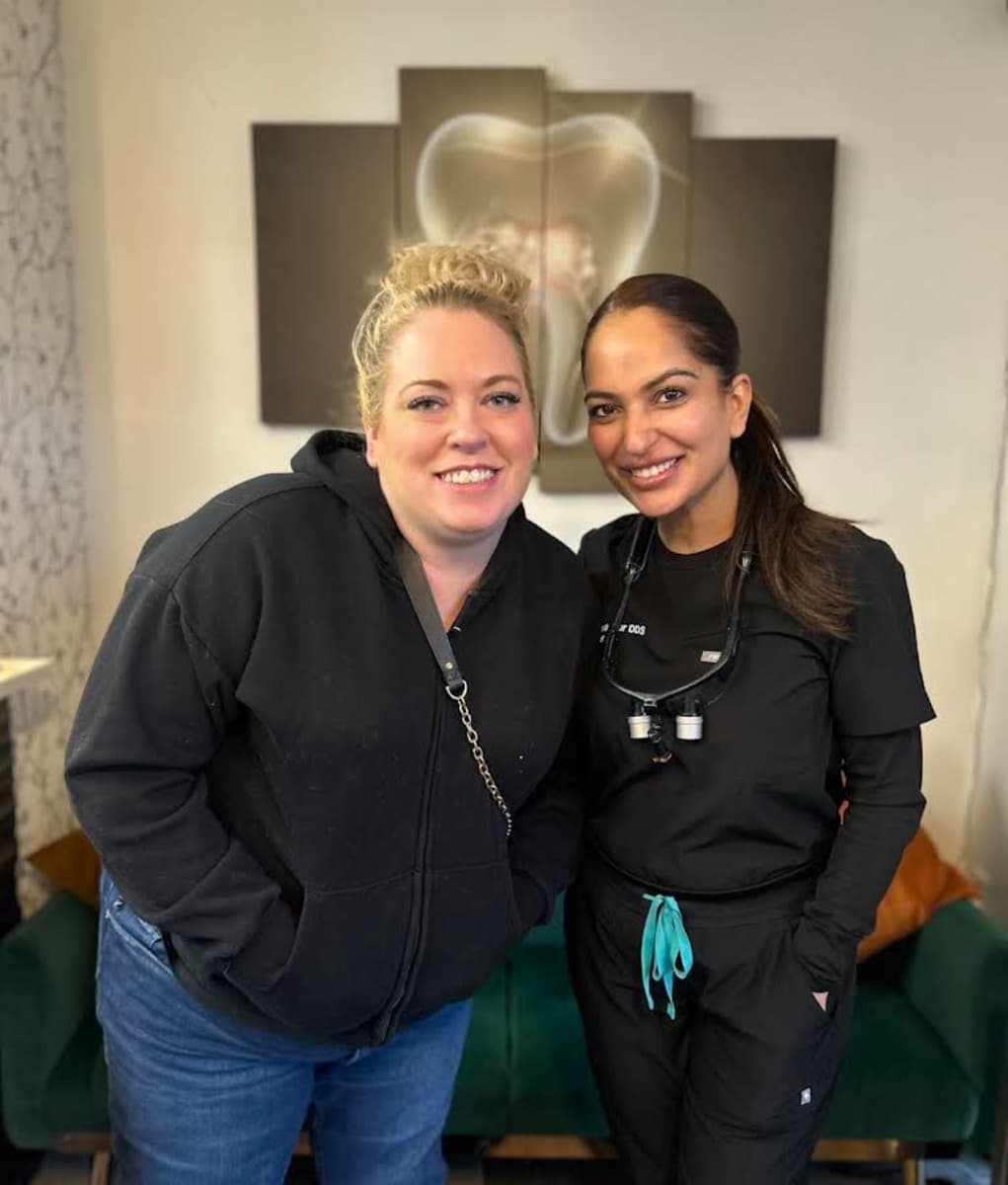 Dr. Sheena Gaur with a patient in the front lobby