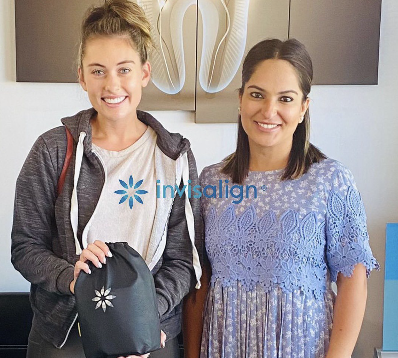 Patient and Dr. Sheena celebrating Invisalign start
