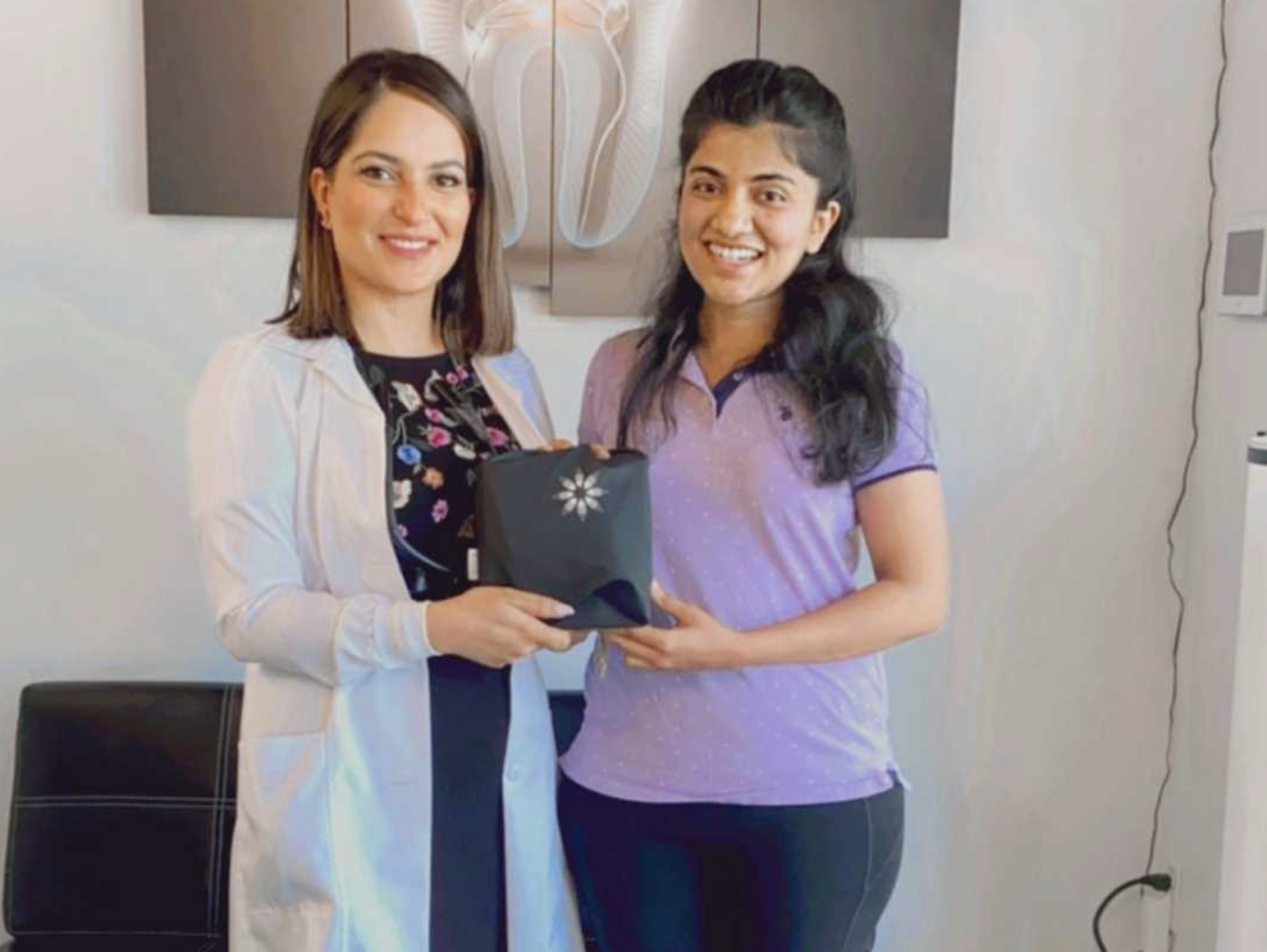 Smiling patient starting Invisalign