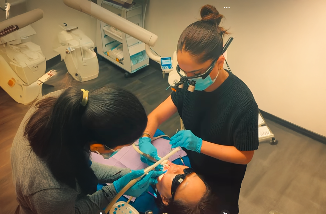 Patient smiling after general dentistry visit with Dr. Sheena